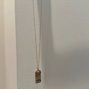 Coach tag pendant necklace
